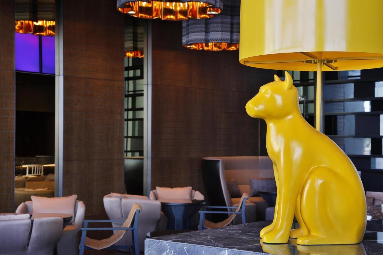 W Muscat Hotel Luaran gambar The Cat