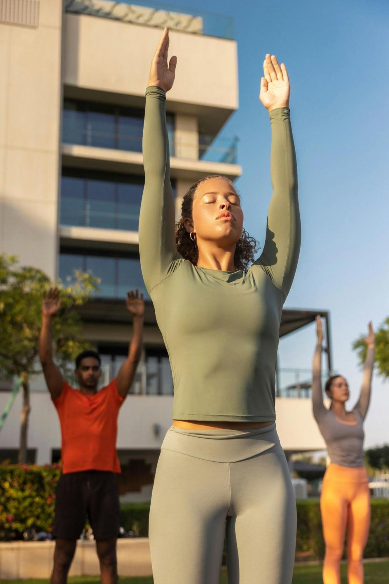 W Muscat Hotel Luaran gambar A woman practicing yoga